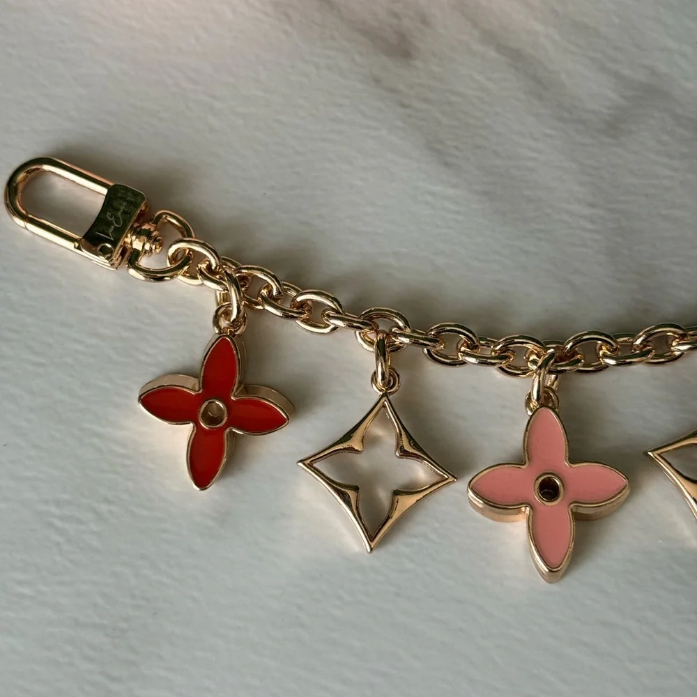 Lux Envee Gold Chain Bag Charm with Red and Pink Flower Charms